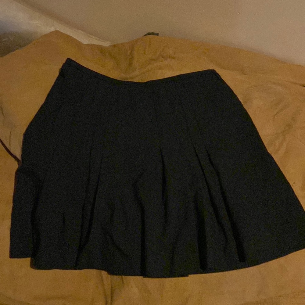 INC pleated black skirt. Size 4. Good condition.
